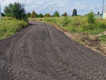 Продолжаются работы по отсыпке дорог асфальтовой срезкой